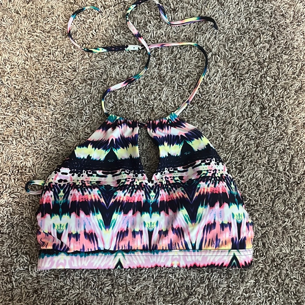 Size S Athleta bikini top. Fun colors with a wrap around neck.